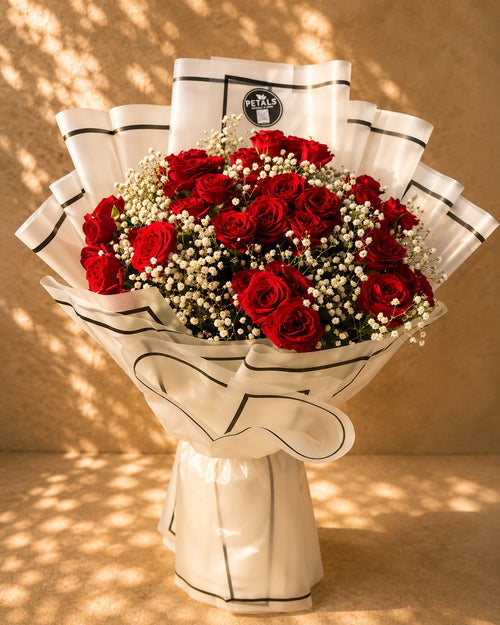 Pure Passion red rose bouquet by Petals in Lahore