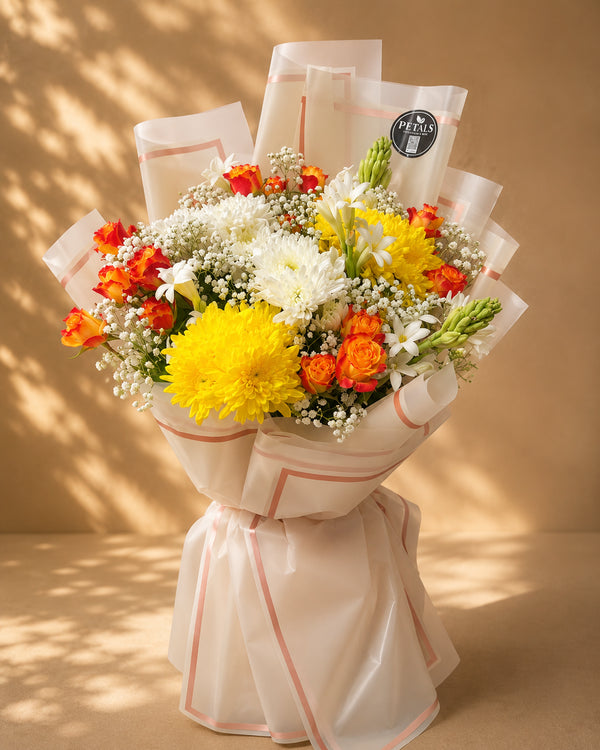 Sunlit Whisper yellow and white flower bouquet by Petals in Lahore
